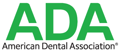 The image shows the logo of the American Dental Association (ADA). It features the bold green letters 